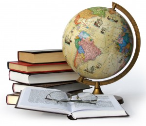 Books globe and glasses